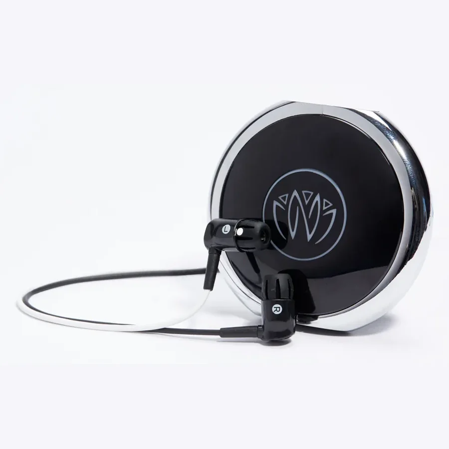 The Neuvana Xen, a round chrome and black control unit with its wired earbuds.